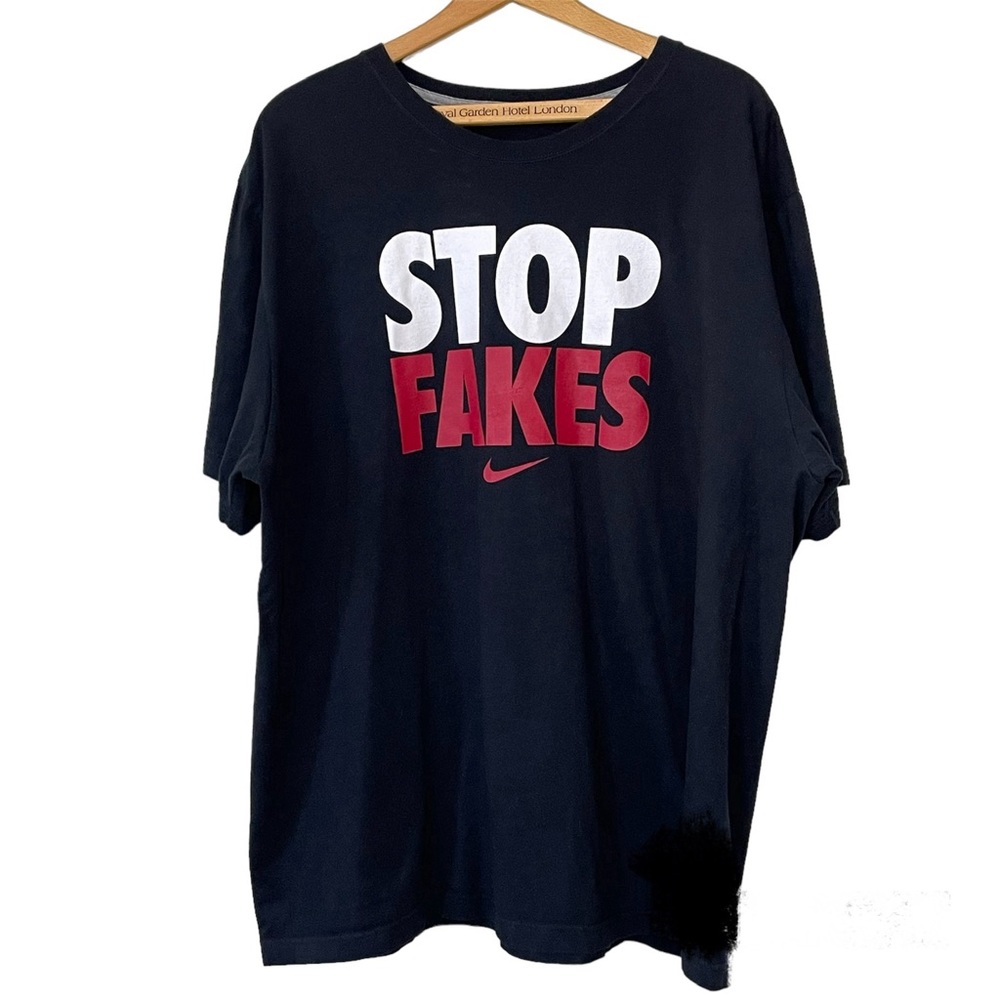Nike Stop Fakes, center graphic, black short sleeved teeshirt. Men’s 3XL